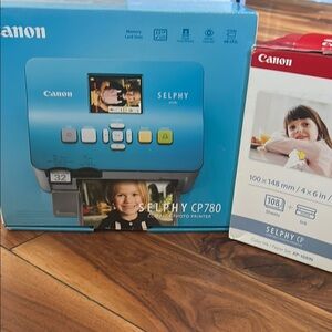 Canon Selphy CP780 Compact Photo Printer - Blue w/ Color Ink and Paper Bundle